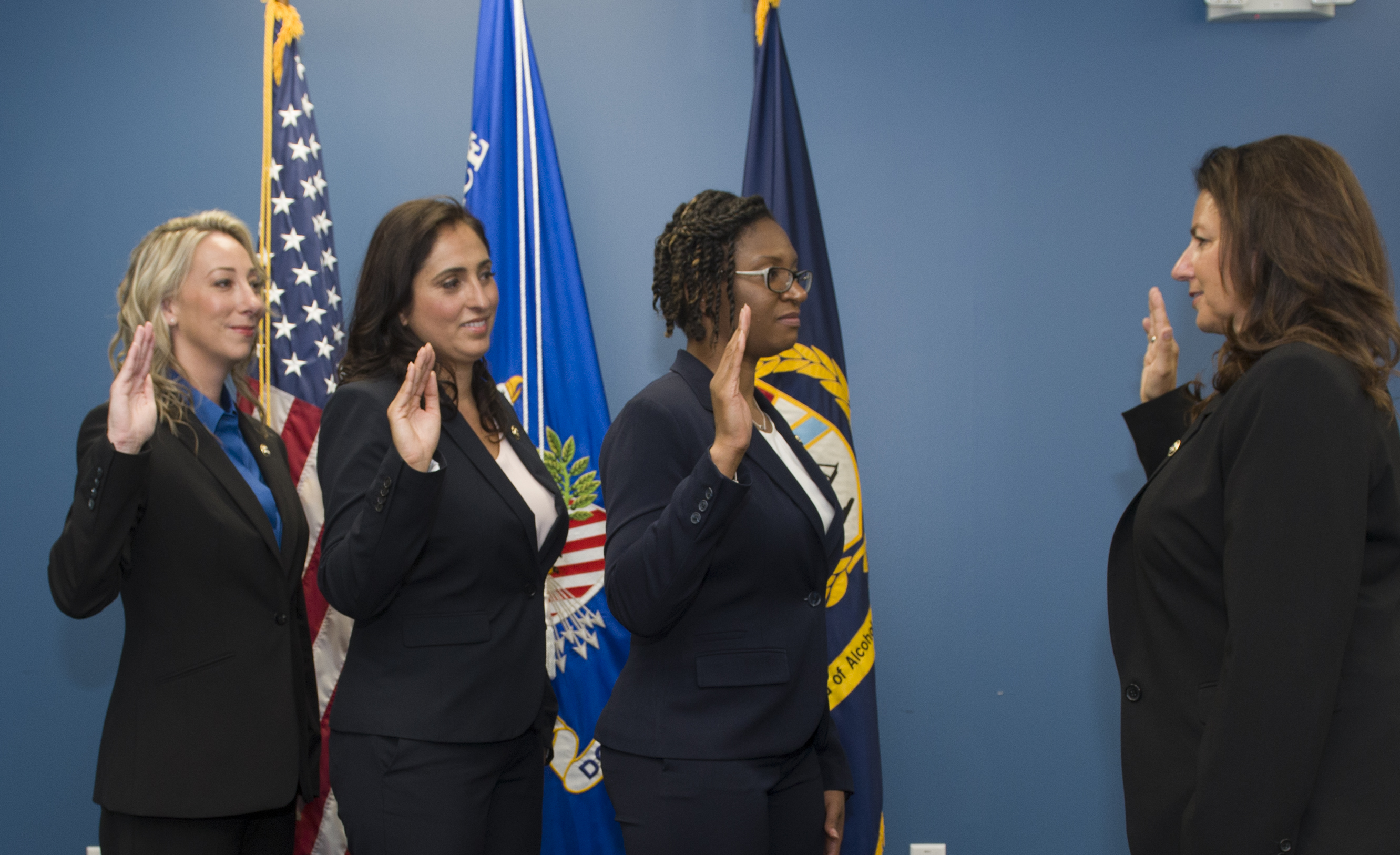 Women being sworn into ATF