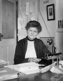 Georgia Hopley sitting at a desk