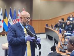 Man holding a weapon in an IAD seminar